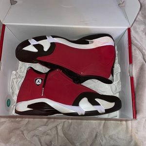 Red and white and black Jordan 14s